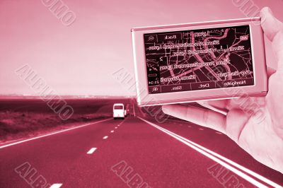 GPS Vehicle navigation system in a man hand.
