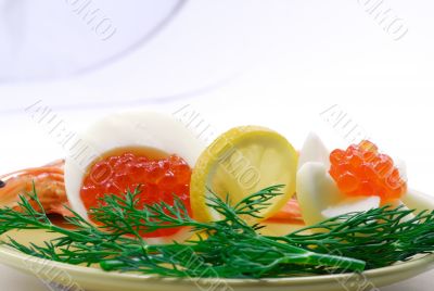 Red salmon caviar and cooked prawns