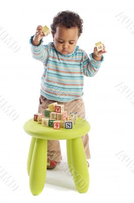 Girl playing with small pieces