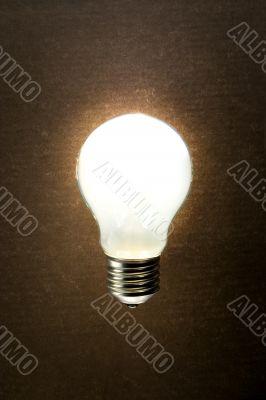Bright lamp on a textured background
