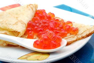 Pancake with red caviar