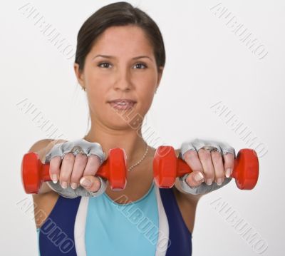 Woman with barbells
