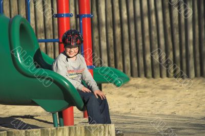 Young Boy on Slide