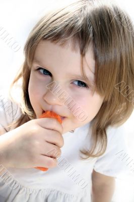 happy girl eatin carrots