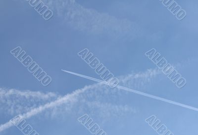 Airplane in a blue sky