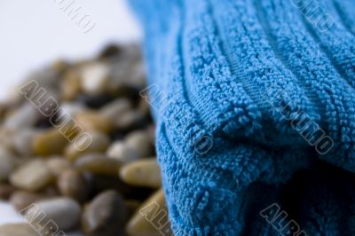 Blue towel and stones