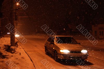 Car in winter street.