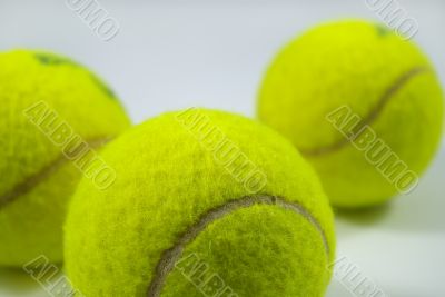 tennis balls on gray