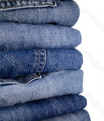 stask of blue jeans