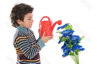 Child watering flowers