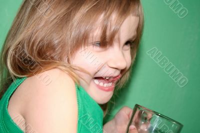 laughing girl with a cup