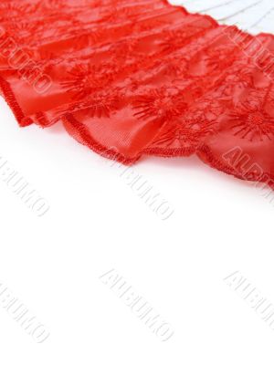 Red fan on white background