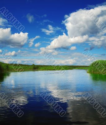 clouds over river