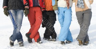 Sport teenagers on snow in sport clothes