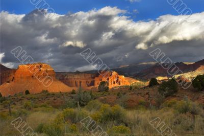 Red rocks and rain clouds.