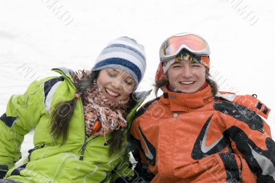 lifestyle image of two young a snowboarders