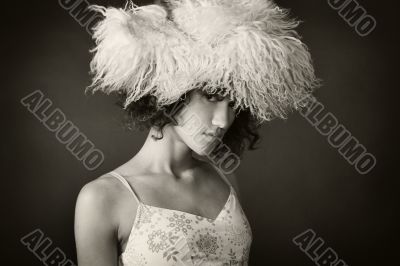 Portrait of a girl with a fur hat on her head