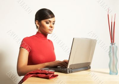 business woman with laptop and phone