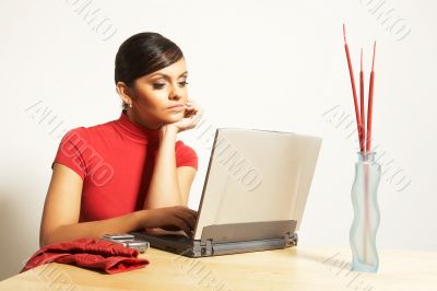 business woman with laptop and phone