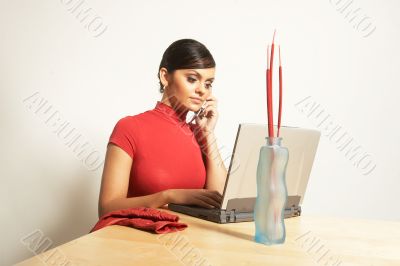 business woman with laptop and phone