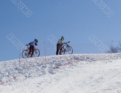 Couple of professional bikers in Tien Shan