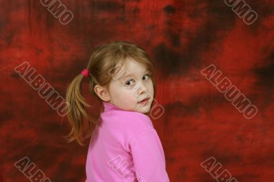 the child on a red background