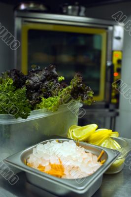 Kitchen, chrome stove; broken ice and lemon