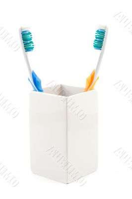 toothbrushes in cup