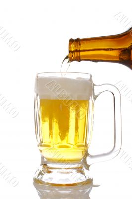Pouring beer into mug
