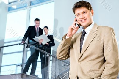 Manger with cellphone