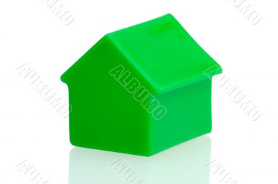 Green house on white background.