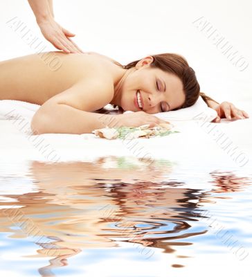 happy massage on white sand