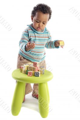 Girl playing with small pieces