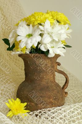 bouquet of chrysanthemum in old vase