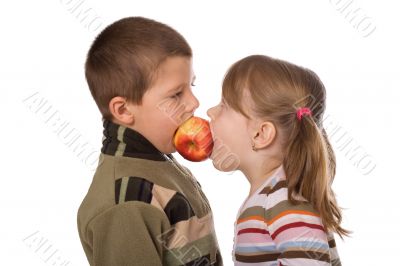Two children and an apple