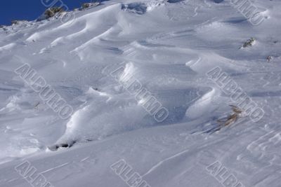 Sastrugi - patterns formed by blowing wind