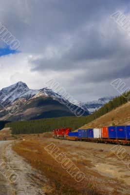 Freight train hauling up the Rocky Mountains