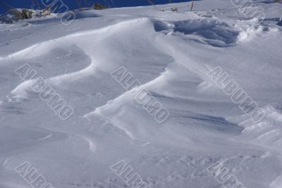 Sastrugi - patterns formed by blowing wind