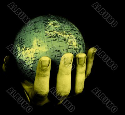 Globe in a girl`s hands