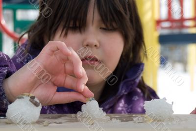 Girl Playing With Snow
