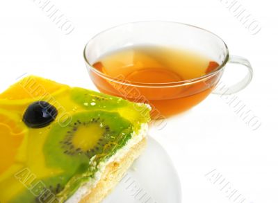 Fruit tart with tea cup