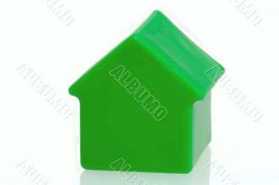 Green house on white background.