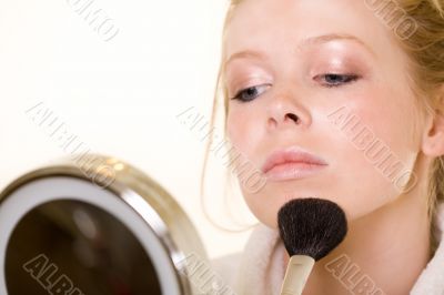 Putting on makeup