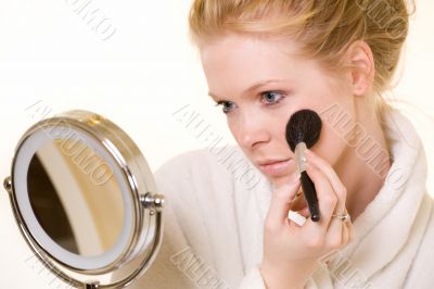 Woman looking in mirror