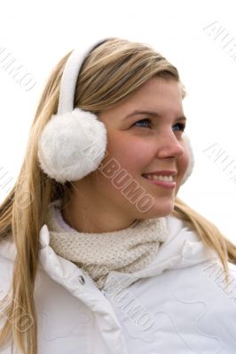 Smiling girl in headset ear muffs