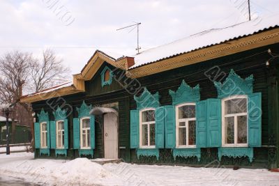 Wooden house with nicely decorated windows