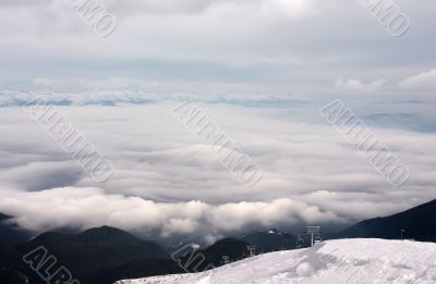 Ski lift with clouds