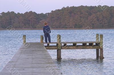 Boy on a Pier