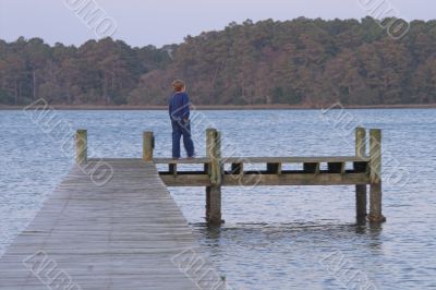 Boy on a Pier