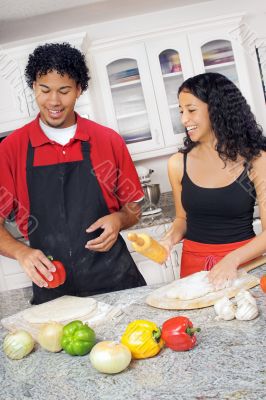 young couple cooking